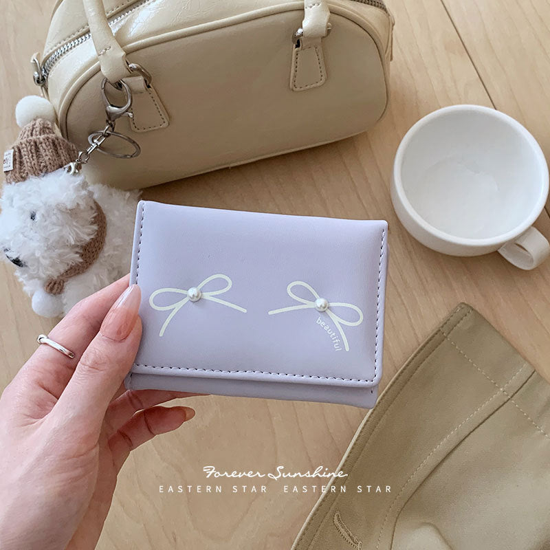 Elegant Bow Pearl Card Holder
